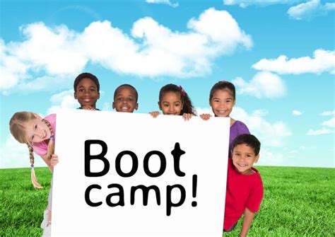 Premium Photo Kids Holding Card Showing Text Boot Camp In Front Of