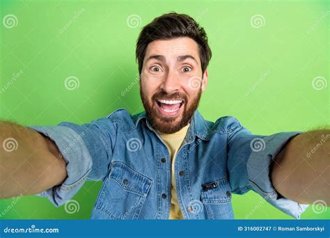 Photo Of Excited Positive Guy Dressed Jeans Shirt Tacking Selfie Empty Space Isolated Green