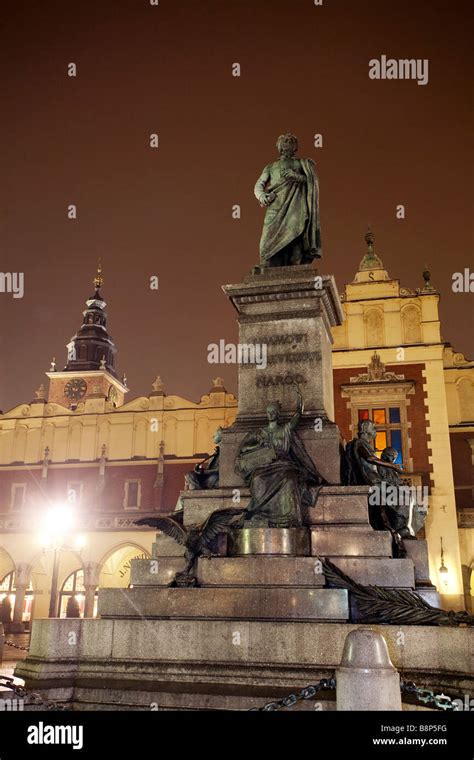 Statue Of Adam Mickiewicz At Night Rynek Glowny Krakow Poland Stock