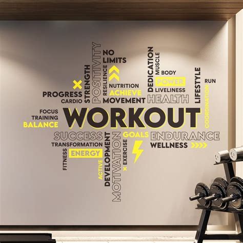 A Wall With The Words Workout Written In Yellow And Black On It Along