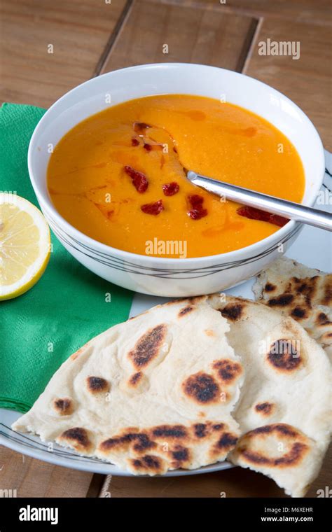 A traditional Turkish meal of Red lentil soup with flatbread and Lemon ...