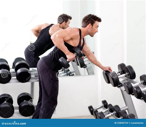 Man With Weight Training Equipment On Sport Gym Stock Photo Image Of