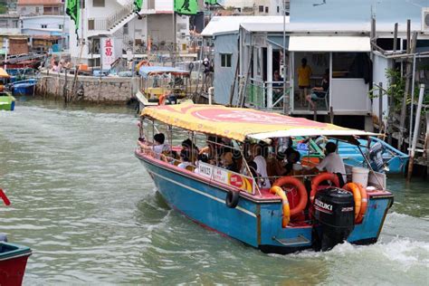 Group Of People Traveling With A Boat At The Dragon Boat Festival In