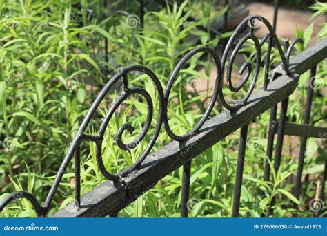 Part of a Black Iron Decorative Fence with a Wrought Iron Pattern Stock ...