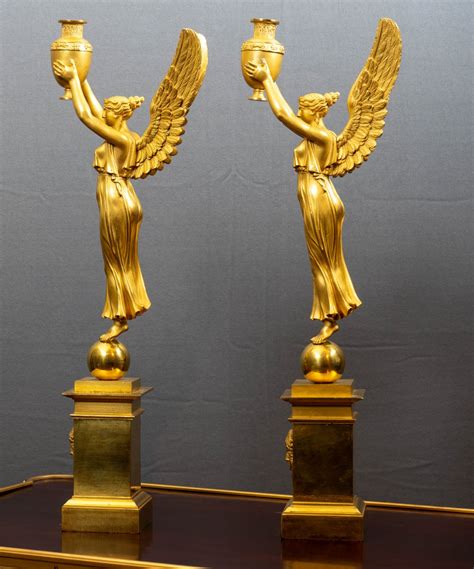 A Pair Of Empire Figural Gilt Bronze Three Light Candelabra Ref