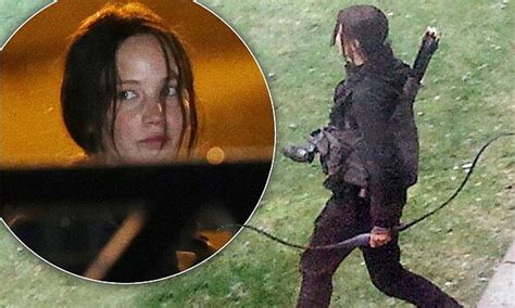 Jennifer Lawrence Films Hunger Games In Paris Armed With Her Bow And Arrow Daily Mail Online