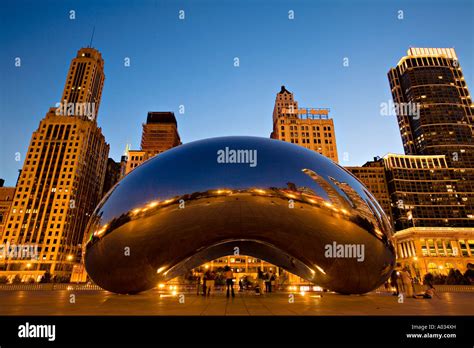 ILLINOIS Chicago Cloud Gate sculpture in Millennium Park at night city ...