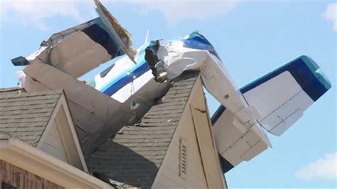 PHOTOS: Small plane crashes into roof of Texas home