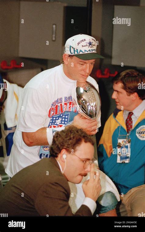 Dallas Cowboys quarterback Troy Aikman rests his chin on the Super Bowl ...