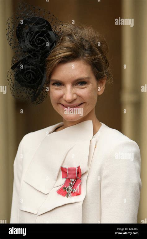 Fashion Designer Natalie Massenet With Her Mbe Awarded To Her During An Investiture Ceremony At