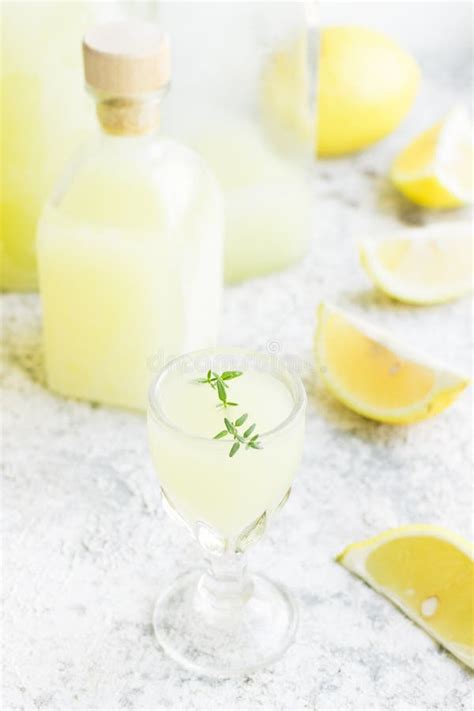 Italian Traditional Liqueur Limoncello With Thyme Stock Photo Image