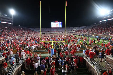 Ole Miss Fans Storm The Field After Upsetting Lsu 55 49 The Oxford