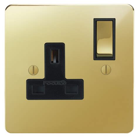 Focus Sb Ambassador Apb181b 1 Gang 13 Amp Switched Socket In Polished Brass With Black Inserts