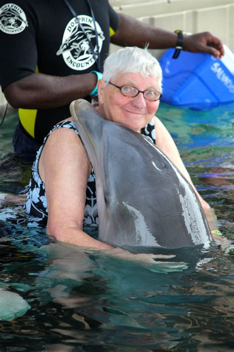 Sweet Dolphin Hug At Dolphin Encounters Blue Lagoon Island Bahamas Dolphin Encounters Blue