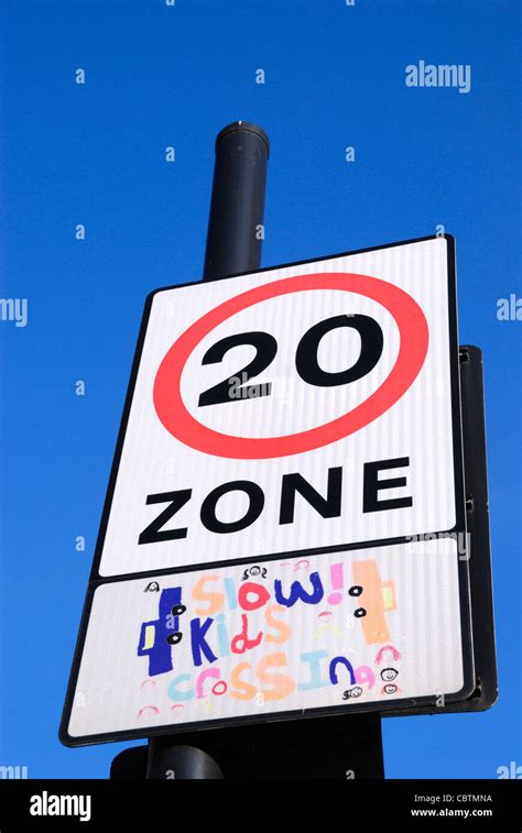 20 Miles Per Hour Speed Limit Zone Road Sign Stock Photo Alamy