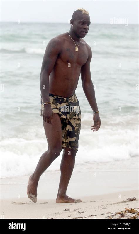 Mario Balotelli And Fiancee Fanny Neguesha Enjoy The Day On Miami Beach During Their Holiday To