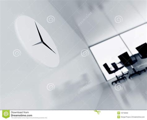 Clock in a modern office. Clock on a wall in a modern office on a ...