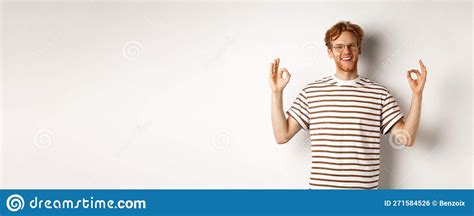 Handsome Young Man With Red Messy Hair And Glasses Smiling Showing Ok