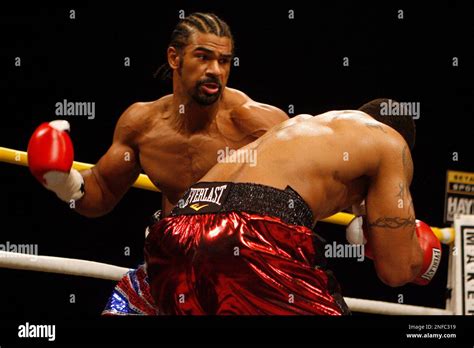 British Heavyweight Boxer David Haye Left Punches American Monte Barrett During Their Wbc