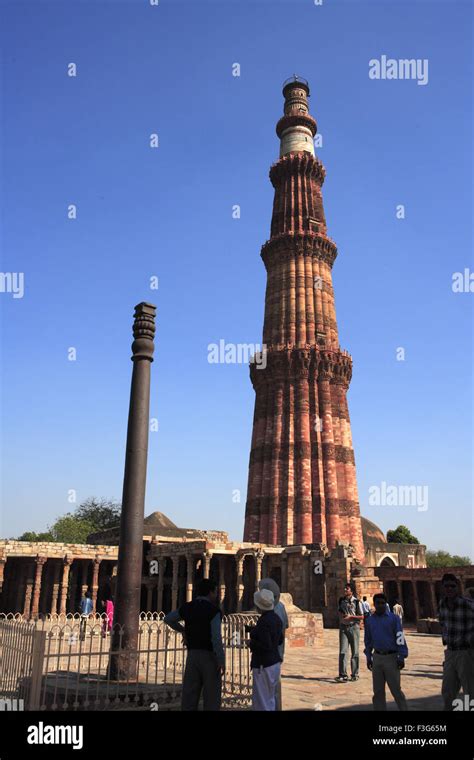 Iron Pillar In Quwwat Ul Islam Mosque And Qutb Minar Red Sandstone