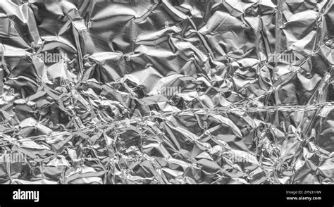 Crumpled Bright Shiny Metallic Silver Aluminium Foil Background Flat