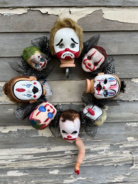 Doll head wreath 4 clowns | Halloween doll, Scary dolls, Creepy doll ...