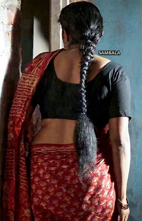 Beautiful Indian Woman In Red And Black Sari