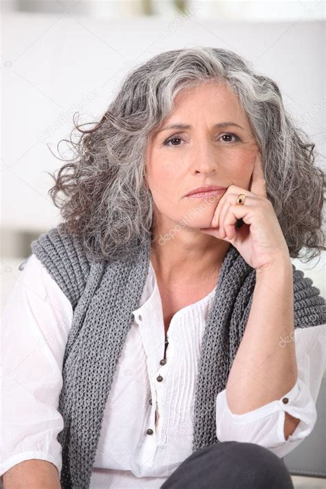 Senior woman with long grey hair — Stock Photo © photography33 #9822611