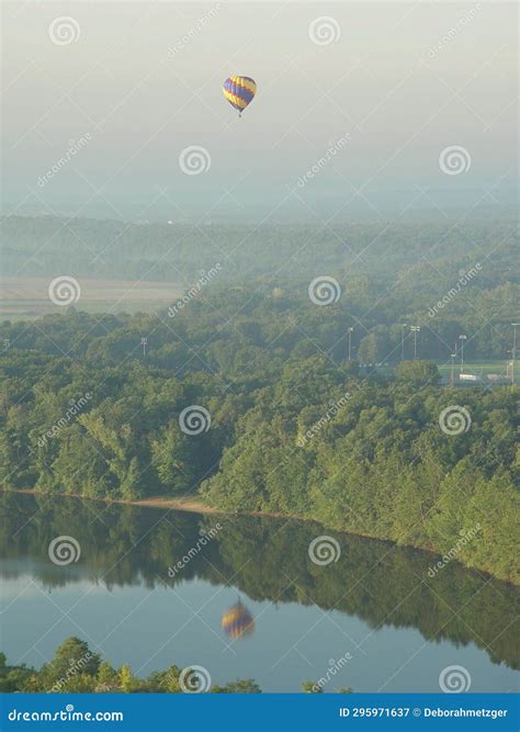 Hot Air Balloon Floating Above River With Reflection Stock Image Image Of Balloon Floating
