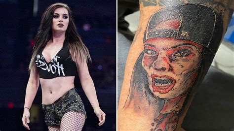 Paige reacts as fan shows off zombie tattoo dedicated to her