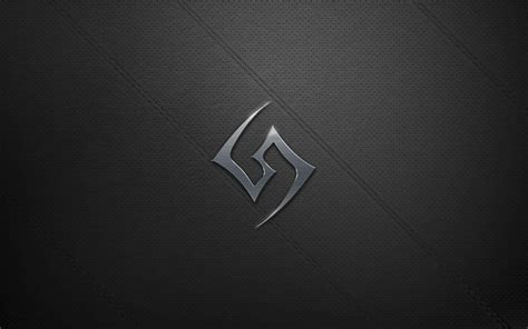 Download A Black And Silver Logo On A Black Background