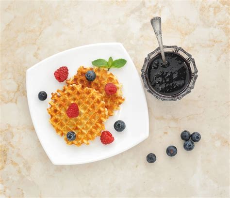 Premium Photo Belgian Waffles With Fresh Berries