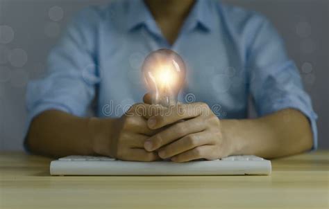 Businessman Holding A Light Bulb Digital Technology Imagine An Idea