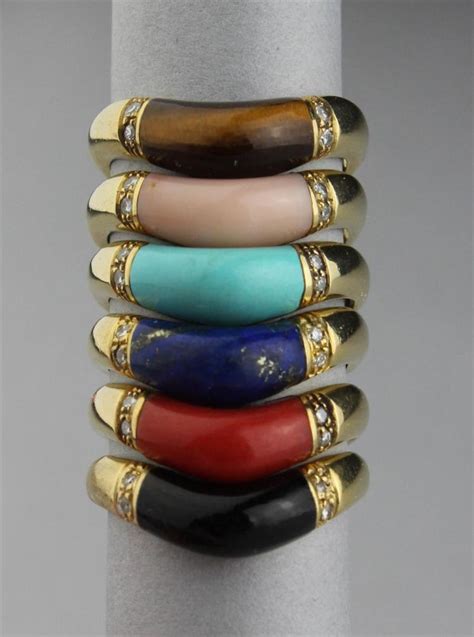 Lot - SIX ITALIAN 18K YELLOW GOLD STACKABLE RINGS WITH INSET STONES AND ...