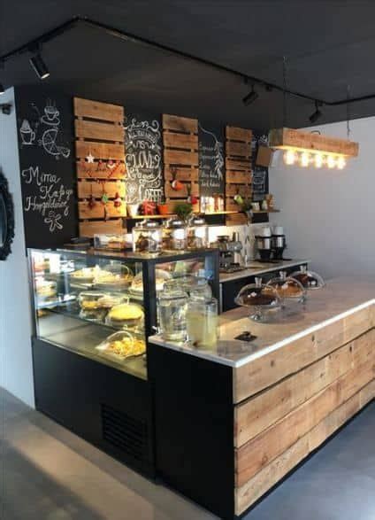 A Bakery With Lots Of Food On Display In The Middle Of It S Counter