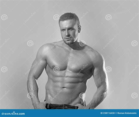 Muscular Bodybuilder Handsome Man Doing Fitness Exercises In Gym Naked Torso Stock Photo