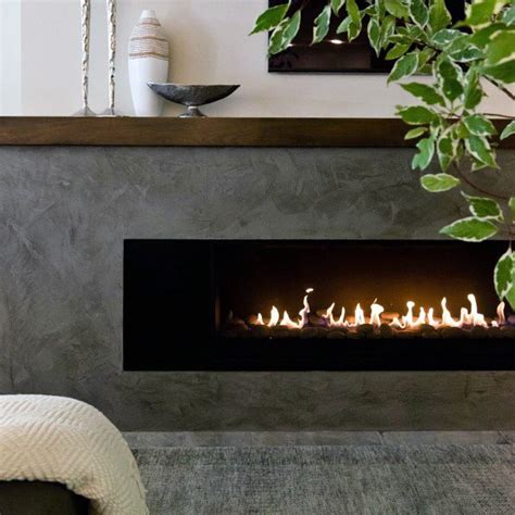 A Modern Fireplace In A Living Room