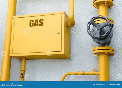 Gas Meter Box And Pipes Near Grey Wall Outdoors Stock Image Image Of