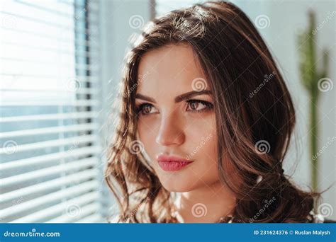 Beautiful Brunette Woman With Natural Hair In Sensual Pose On Bed With Open Stock Photo Image
