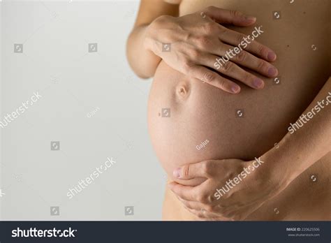 Naked Woman Holding Her Pregnant Belly Stock Photo 220625506 Shutterstock