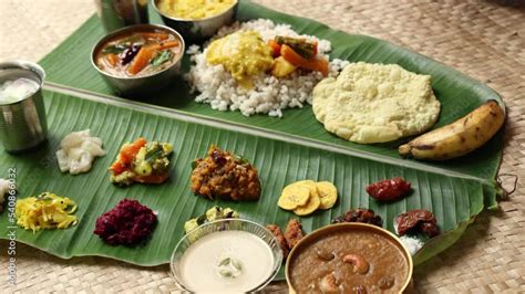 Traditional Onam Sadhya Rice Sambar Rasam Parippu Dal Curry Ghee