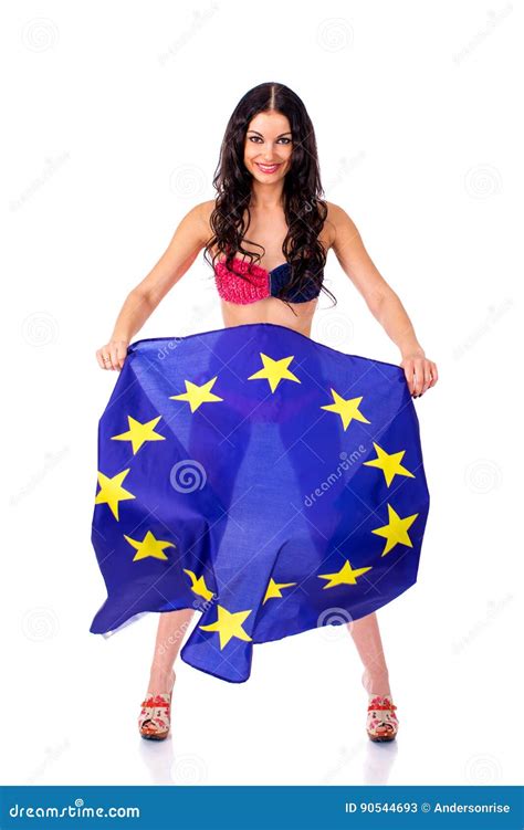 Young Woman Holding A Large Flag Of The European Union Stock Image