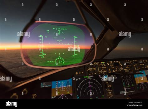 Heads Up Display HUD in flight deck cockpit of a modern commercial jet ...