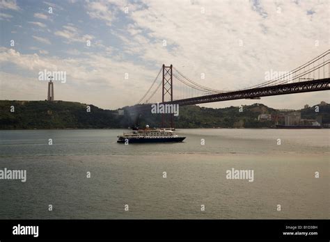 Ms Island Say Sailing Under The 25 De Abril Bridge Lisbon Portugal