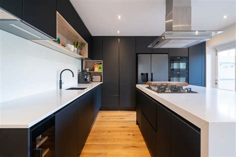 Black Handleless Kitchen In Bladon Contemporary Kitchen