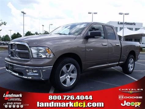 2010 Austin Tan Pearl Dodge Ram 1500 Big Horn Quad Cab 31851083 Photo