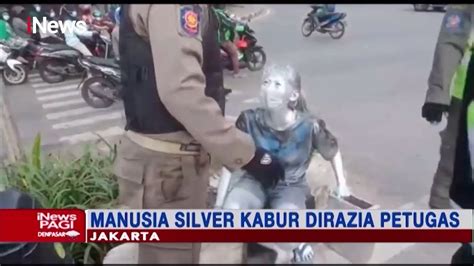 Hindari Razia Satpol PP Manusia Silver Di Kemayoran Berlarian Ke