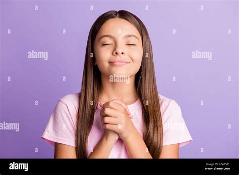 Photo Of Optimistic Nice Brunette Girl Hold Hands Wear T Shirt Isolated