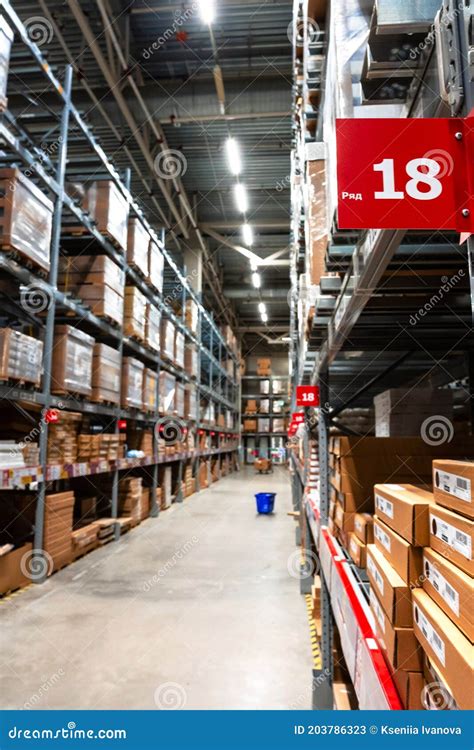 Large Warehouse Interior With Rows Of Shelves And Carts In Ikea