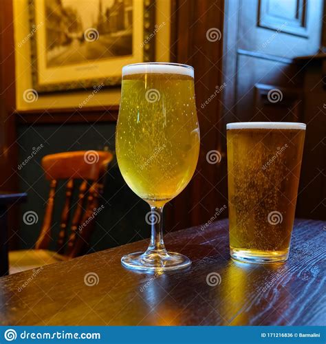 Misty Glasses With Two Pints Of Cold Scotch Ale Amber Pale Ale Lager